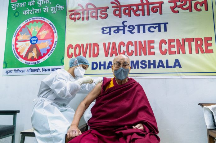 2021-03-06T100453Z_968643108_RC2M5M9AMI2Q_RTRMADP_3_HEALTH-CORONAVIRUS-VACCINE-DALAILAMA-scaled