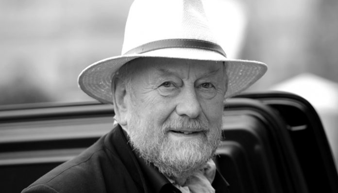 Danish cartoonist Westergaard, who sparked anger in the Muslim world with his caricatures of the prophet Mohammed, arrives for a news conference before the awarding ceremony in Potsdam
