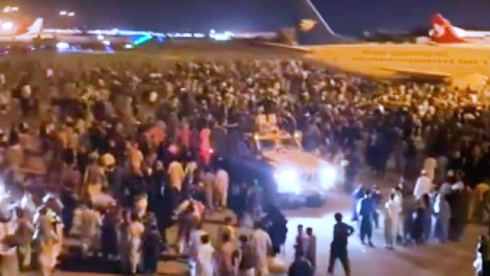 https___cdn.cnn.com_cnnnext_dam_assets_210815191545-kabul-airport
