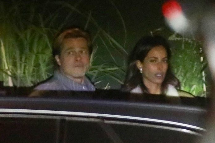 *PREMIUM-EXCLUSIVE* Brad Pitt can't contain himself around his new girlfriend as he steps out to celebrate his 59th birthday!