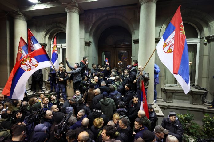 Supporters of the opposition SPN coalition protest in Belgrade